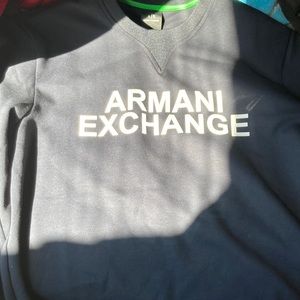 I am selling a brand new size large Armani Exchange crewneck navy blue.